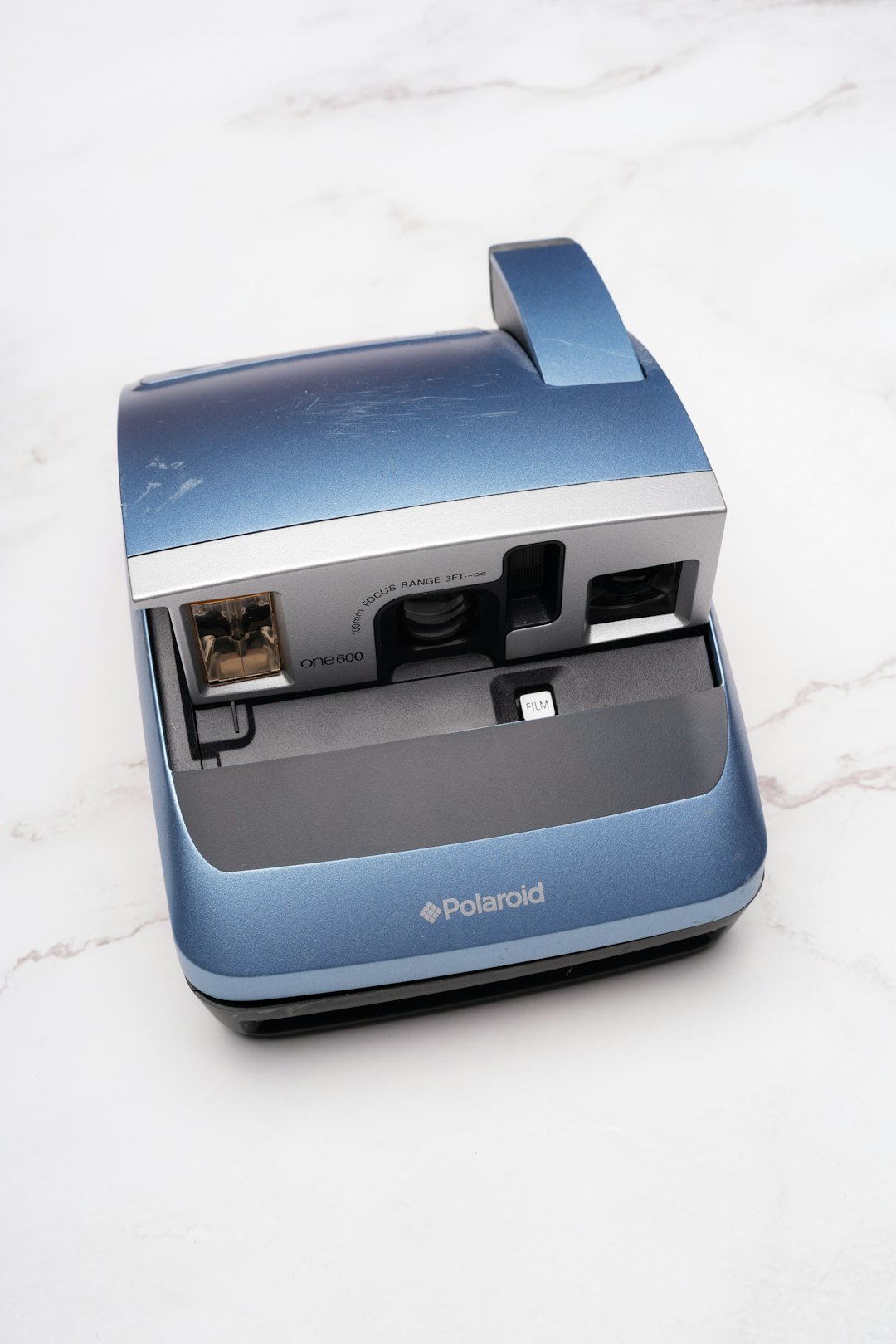 a-blue-and-black-electronic-device-gcq-usi-4q8